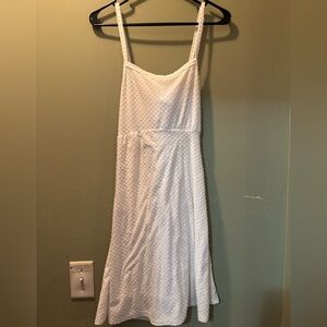 woman’s backless tie dress